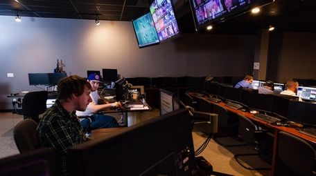 NeuLion employees monitor streaming digital video broadcasting in