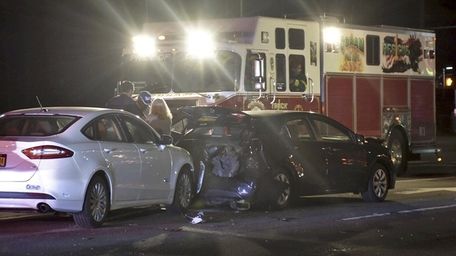 Suffolk County police respond to a crash Monday