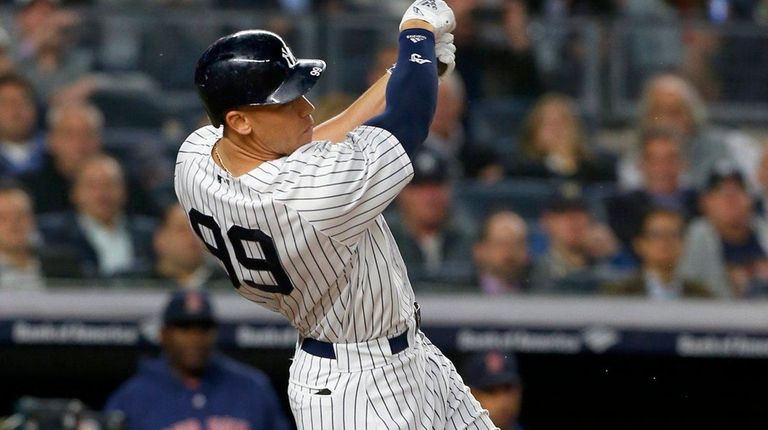 Yankees outfielder Aaron Judge follows through on a