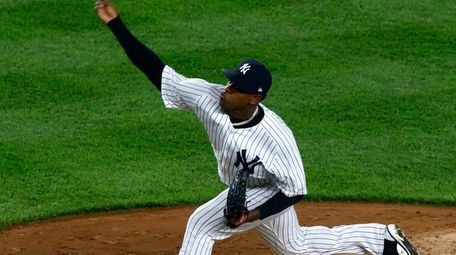 Yankees pitcher Luis Severino pitches against the Red