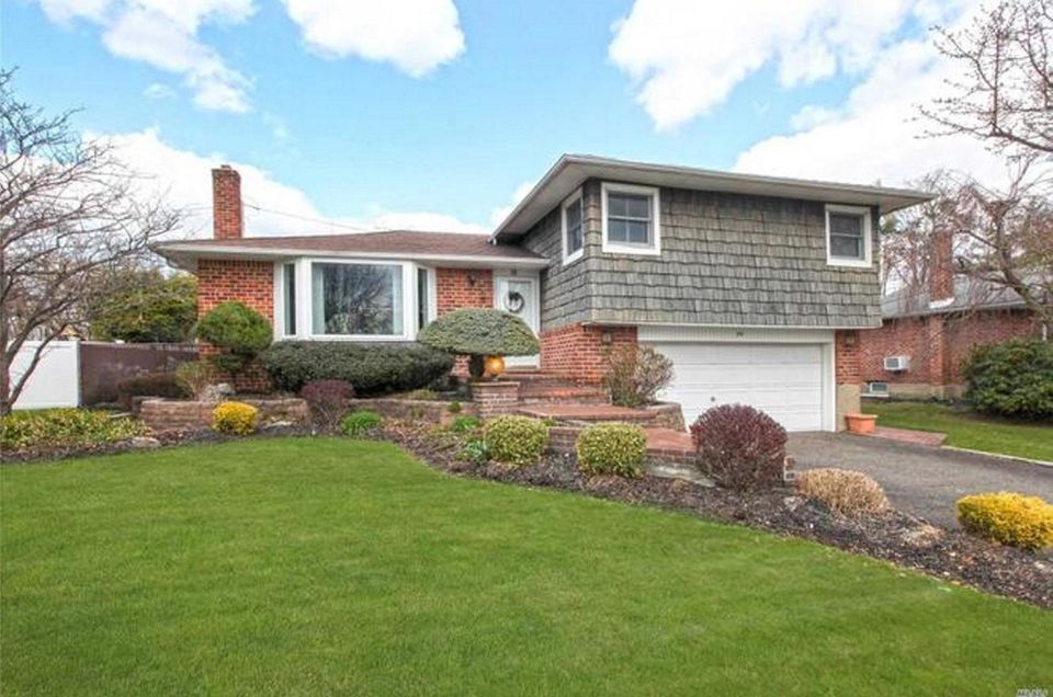 This Plainview split-level includes three bedrooms and two