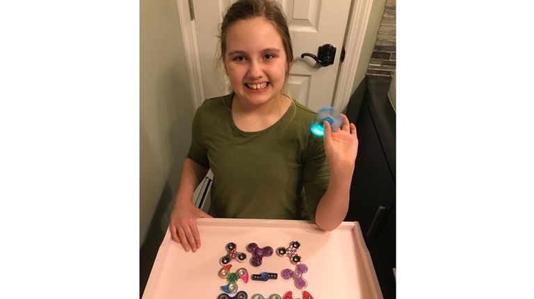 Kidsday reporter Sydney Schoettl with her fidget spinner