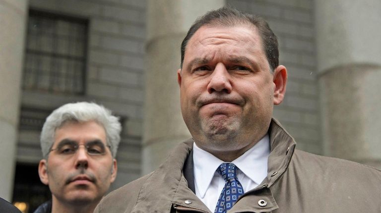 Joseph Percoco, right, exits a federal courthouse in
