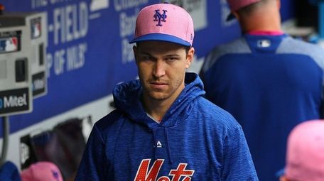 Jacob deGrom of the Mets leaves the dugout