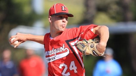 Connetquot's Joseph Savino delivers against Newfield in the