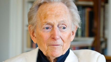 Author and journalist Tom Wolfe at home in