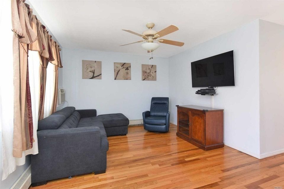 The living room in this East Meadow Cape