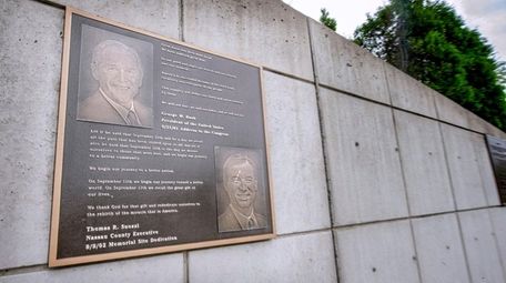 A plaque showing George W. Bush and Thomas