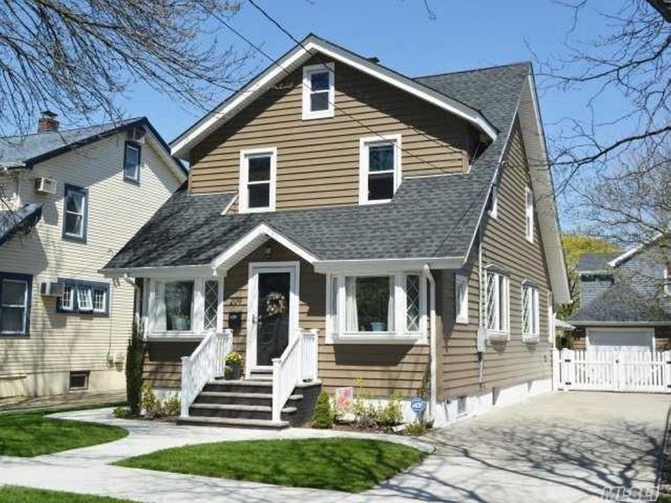 This Floral Park Colonial includes three bedrooms and