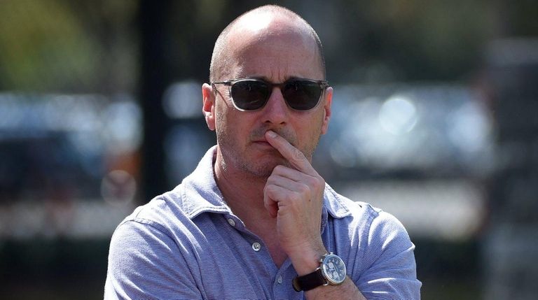 Yankees GM Brian Cashman on the field during