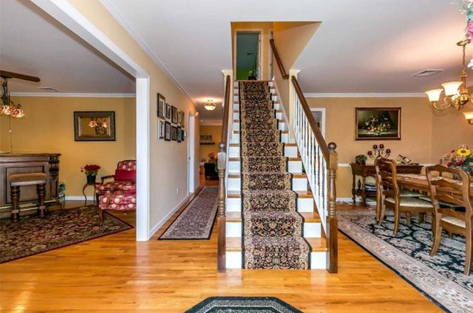The entry foyer in this Bethpage Colonial is