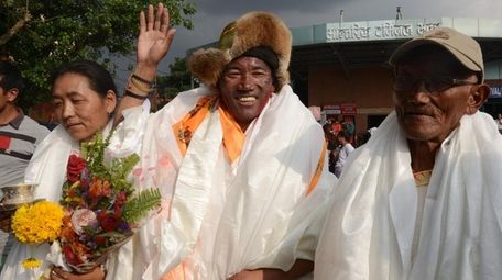 Nepali sherpa Kami Rita, 48, arrives triumphantly Sunday