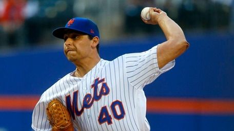 Jason Vargas of the Mets pitches in the
