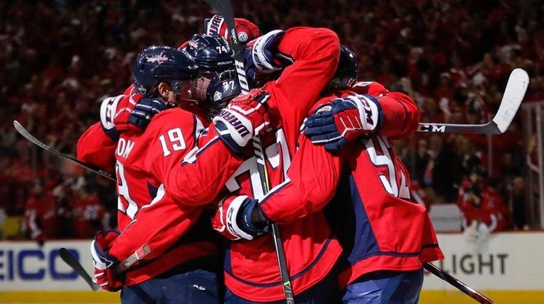 Capitals right wing T.J. Oshie celebrates with his