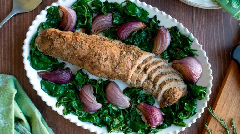 Seasoned pork roasted with red onion wedges and