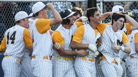Massapequa celebrates their two-game sweep of Plainview-Old Bethpage