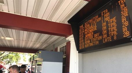 Riders wait for their train on Thursday near