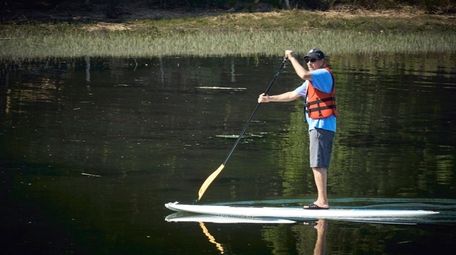 A paddler meets the stillness of Stony Brook