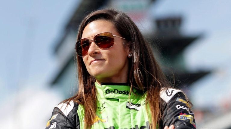 Danica Patrick waits during qualifications for the