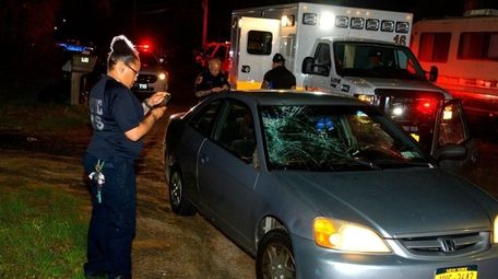 The scene on Cumberland Street in Mastic after