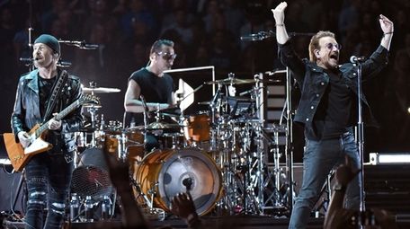 The Edge, left, Larry Mullen Jr. and Bono