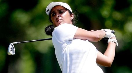 Syosset's Malini Rudra hits her tee shot on