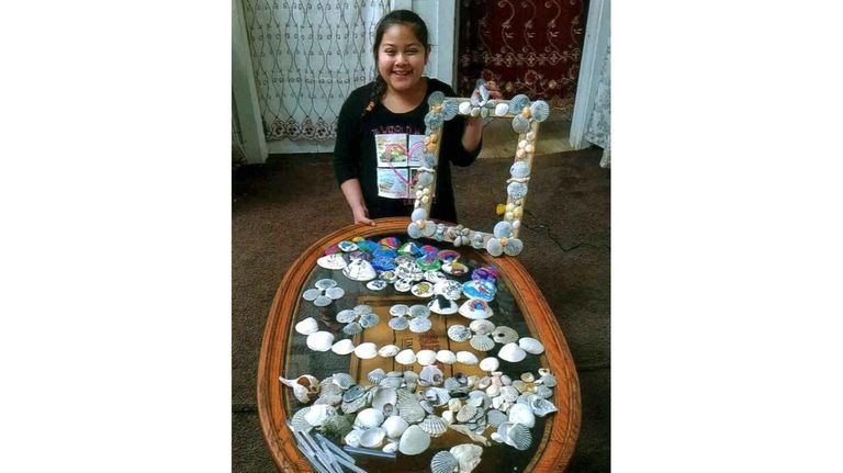 Kidsday reporter Estefani Gomez with her shell collection
