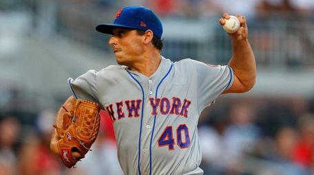 Mets' Jason Vargas delivers a pitch in the