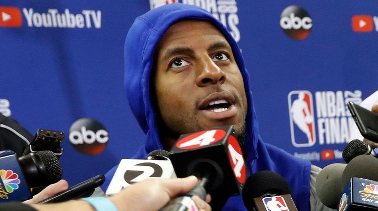 Warriors forward Andre Iguodala responds to a question
