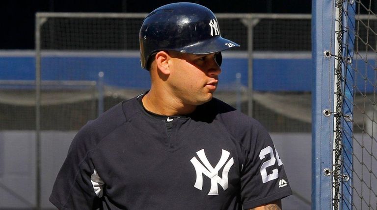Yankees catcher Gary Sanchez looks on during batting
