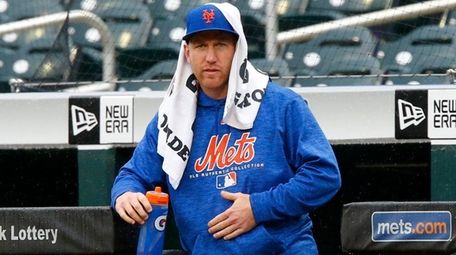 Todd Frazier of the Mets looks on from