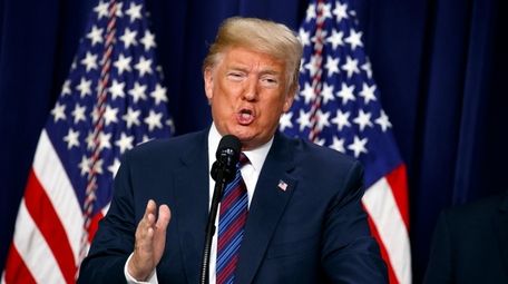 President Donald Trump speaks during a bill signing