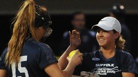 Skyler Cirillo of Lindenhurst #5, right, gets congratulated