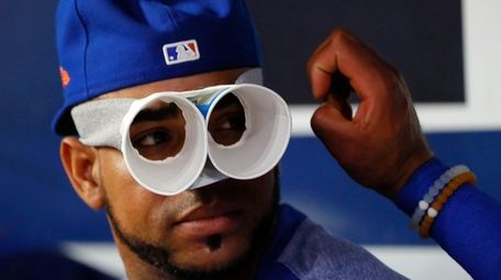 Yoenis Cespedes jokes around in the Mets dugout