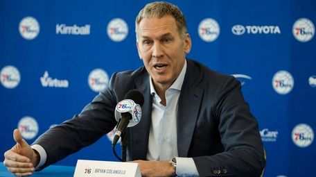 Bryan Colangelo speaks with members of the media