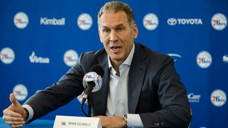 Bryan Colangelo speaks with members of the media