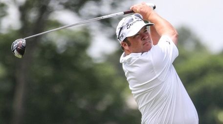 Andrew Svoboda of Engineers Country Club drives off