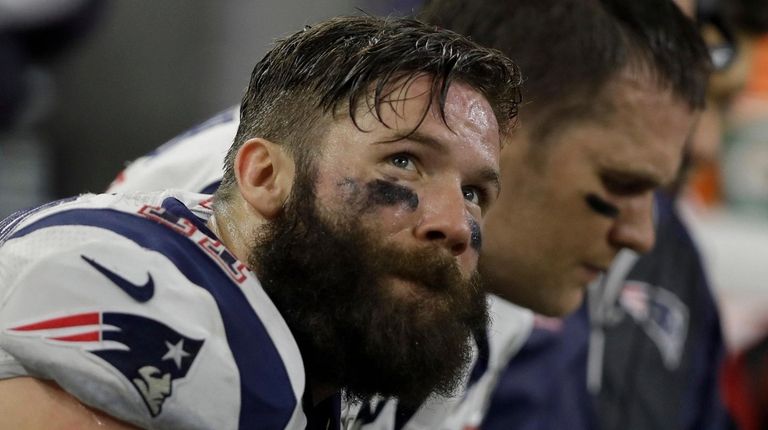 Patriots wide receiver Julian Edelman sit on the