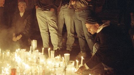 Mourners at an AIDS candlelight vigil in 1991.