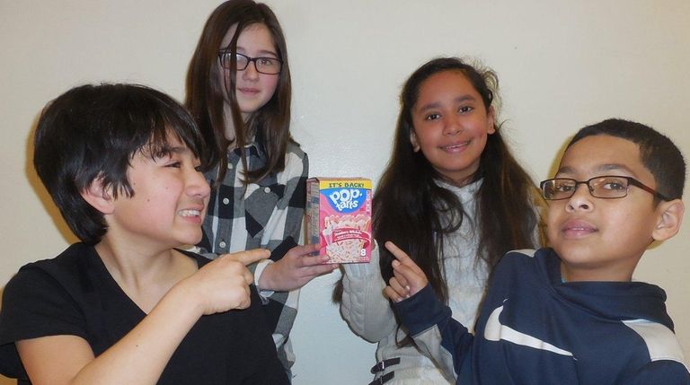 Kidsday reporters, from left, P.J. Cordero, Melissa Albino,