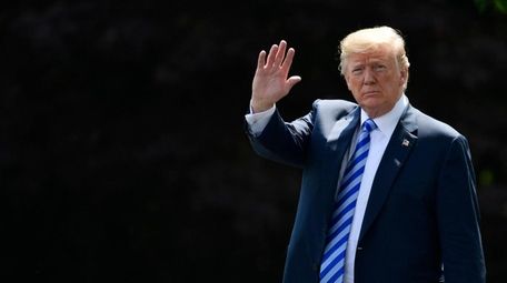 President Donald Trump walks to Marine One last