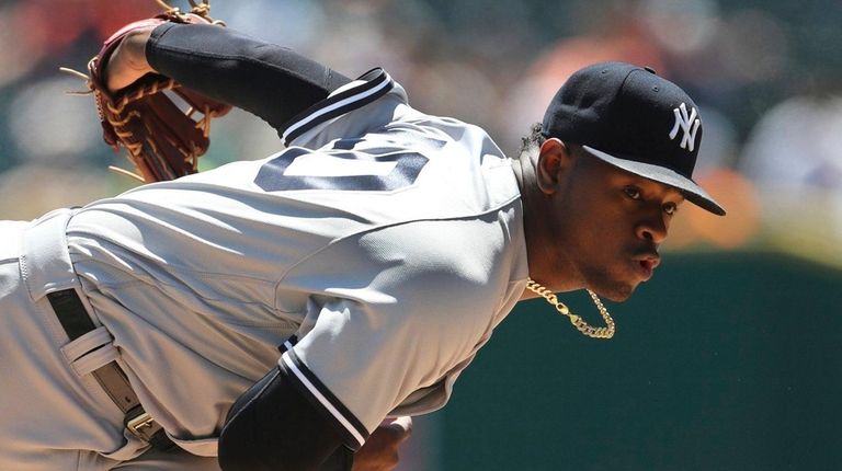 Yankees pitcher Luis Severino delivers during the first