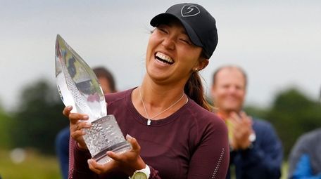 Annie Park celebrates after winning the ShopRite LPGA