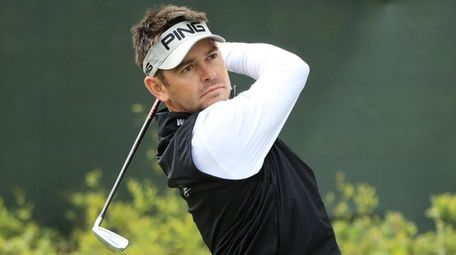 Louis Oosthuizen plays a shot during practice rounds