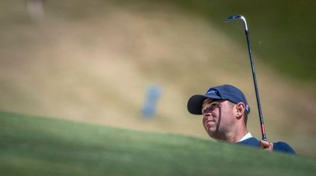 Gary Woodland working on his game around the