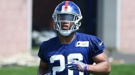 Giants running back Saquon Barkley participates in OTAs