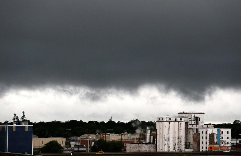 Rain clouds appear over downtown Springfield, Mo., on