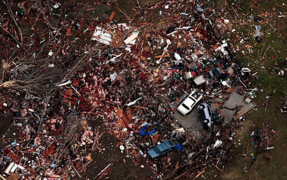 Debris marks the site of a home in