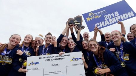 Cold Spring Harbor players celebrate their state Class