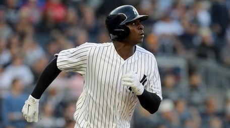 Didi Gregorius of the Yankees watches the flight